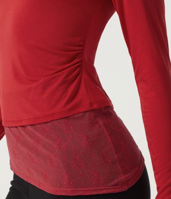 Top décontracté asymétrique à une épaule, manches longues, coupe slim, à fronces et dentelle contrastée.