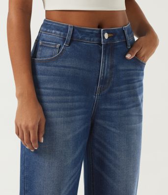 Lässige Baumwoll-Jeans mit mittlerer Bundhöhe, weitem Bein, umgeschlagenem Saum und Taschen Lässige Baumwoll-Jeans mit mittlerer Bundhöhe, weitem Bein, umgeschlagenem Saum und Taschen
