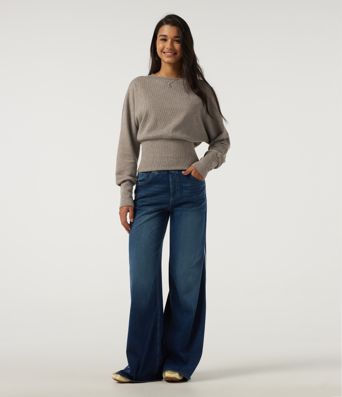 Top casual de punto acanalado con cuello redondo y mangas largas