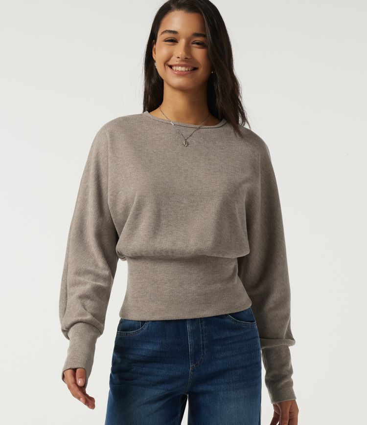 Top casual de punto acanalado con cuello redondo y mangas largas