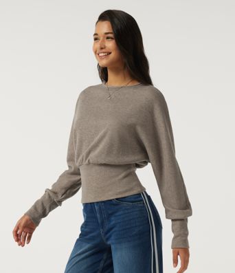 Top casual de punto acanalado con cuello redondo y mangas largas