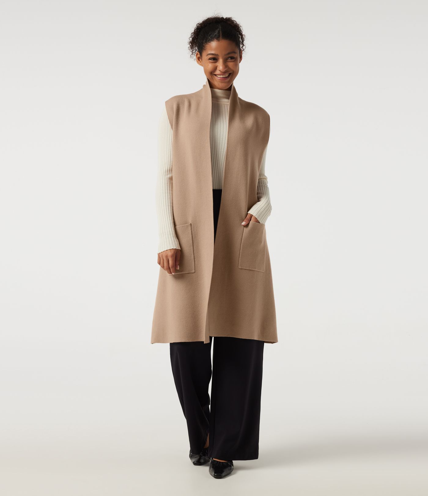 Cardigan long sans manches, ouvert sur le devant, avec poches
