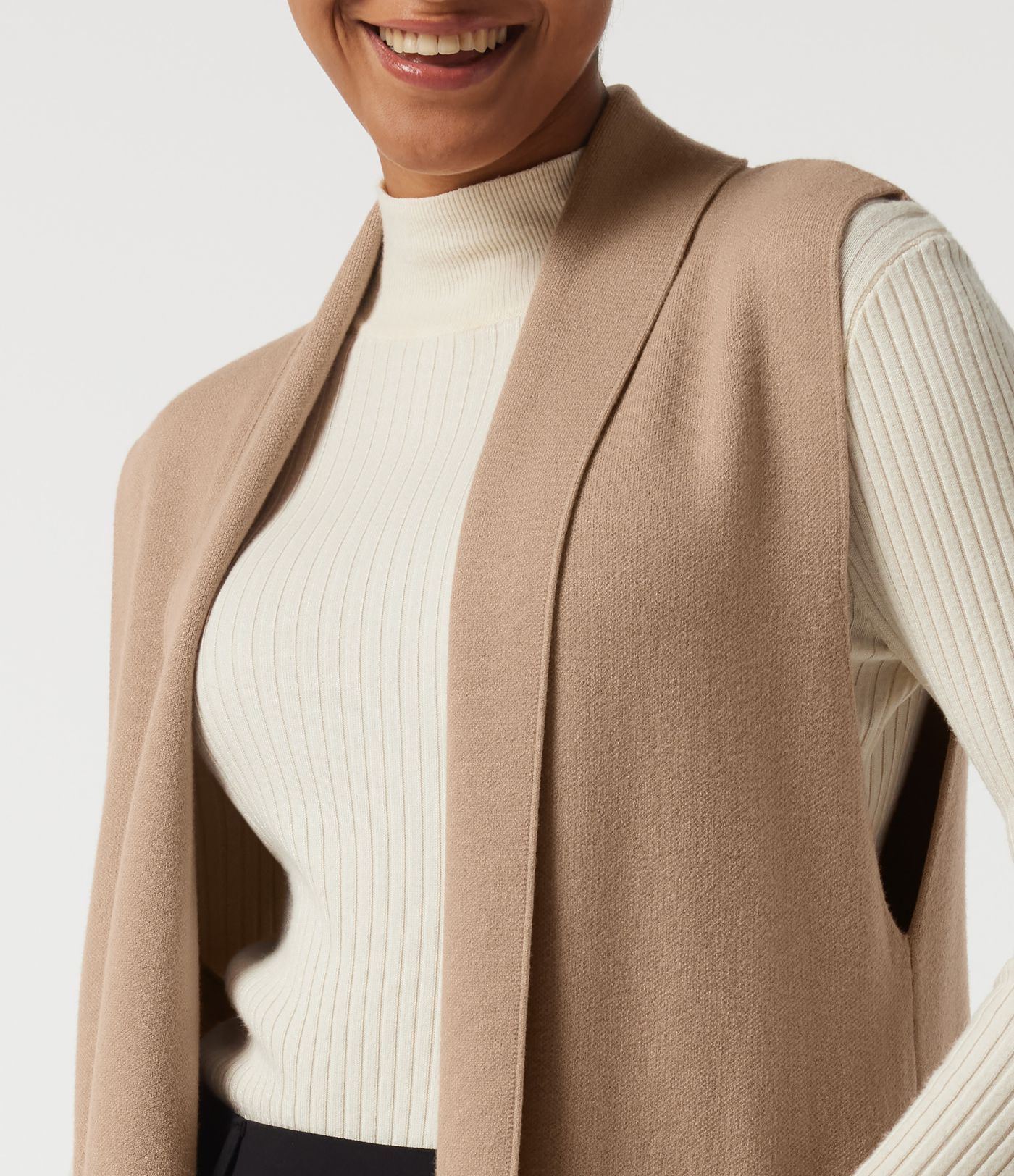 Cardigan long sans manches, ouvert sur le devant, avec poches