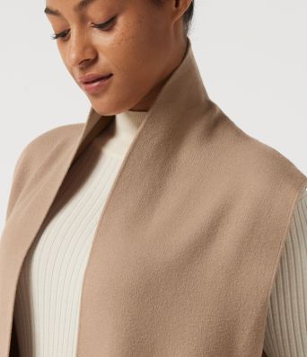Cardigan long sans manches, ouvert sur le devant, avec poches