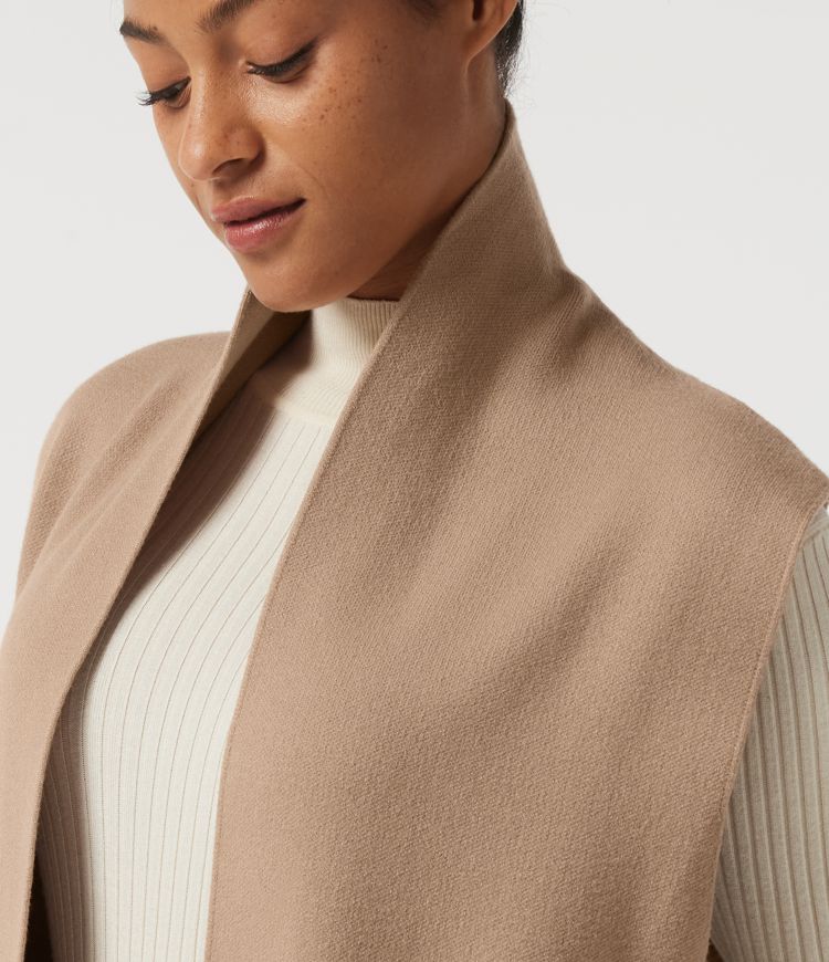 Cardigan long sans manches, ouvert sur le devant, avec poches