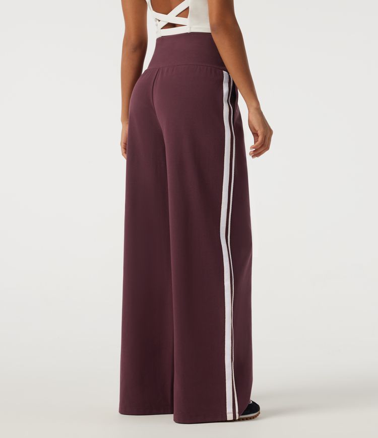 Hoch taillierte, bauchformende, weit geschnittene Colorblock-Freizeithose mit seitlichem Streifen und Taschen