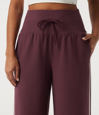 Hoch taillierte, bauchformende, weit geschnittene Colorblock-Freizeithose mit seitlichem Streifen und Taschen