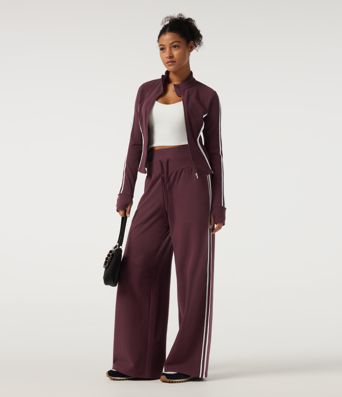 Hoch taillierte, bauchformende, weit geschnittene Colorblock-Freizeithose mit seitlichem Streifen und Taschen