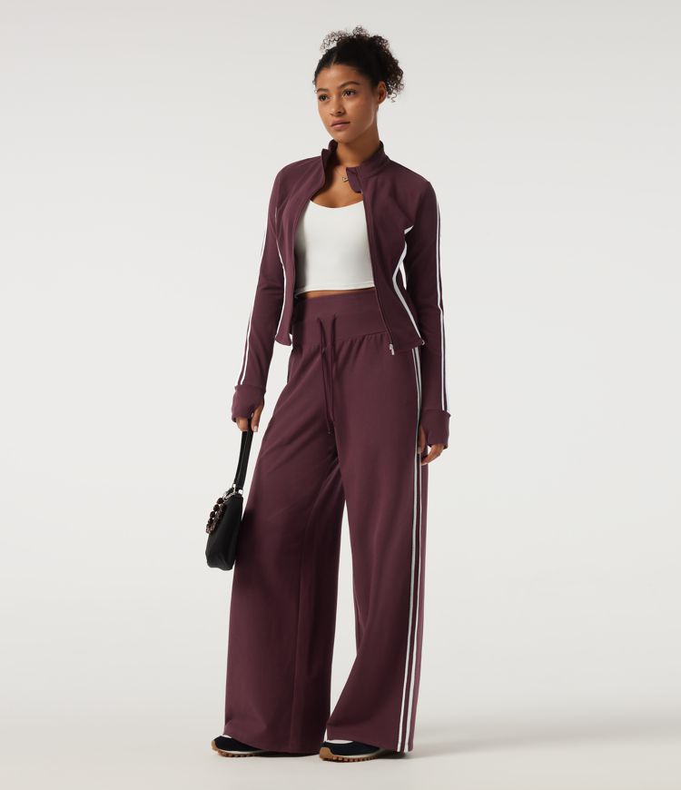 Hoch taillierte, bauchformende, weit geschnittene Colorblock-Freizeithose mit seitlichem Streifen und Taschen