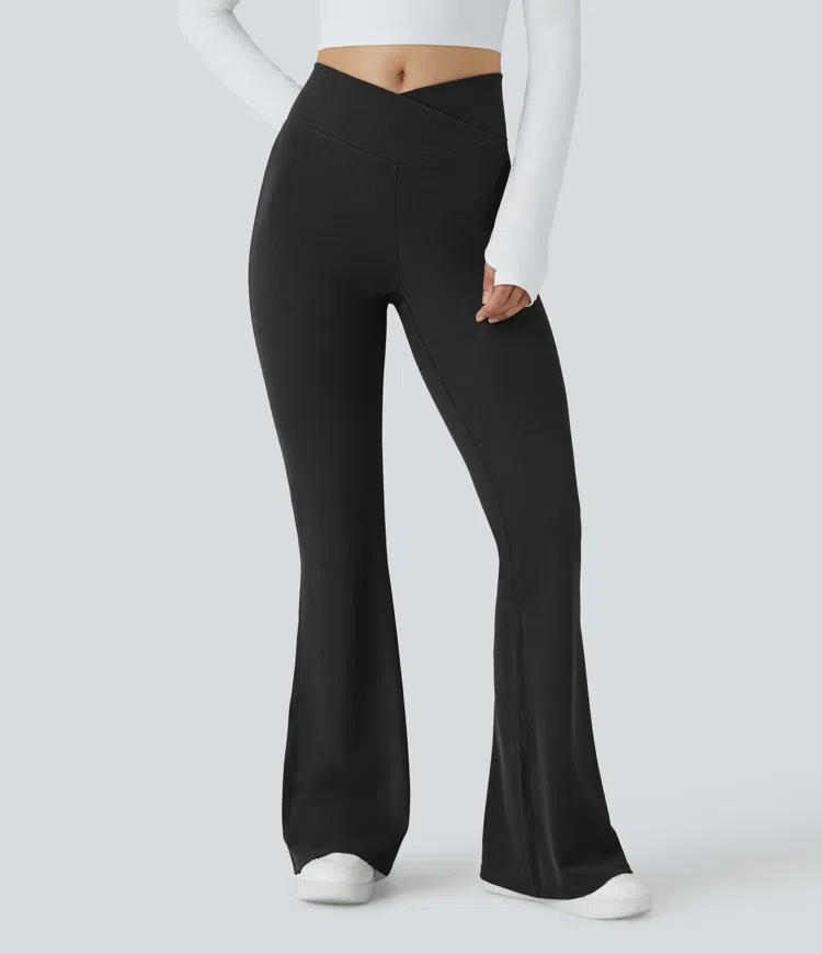 Negro Pantalones flare casual de tejido waffle con cintura alta cruzada y bolsillos / 1