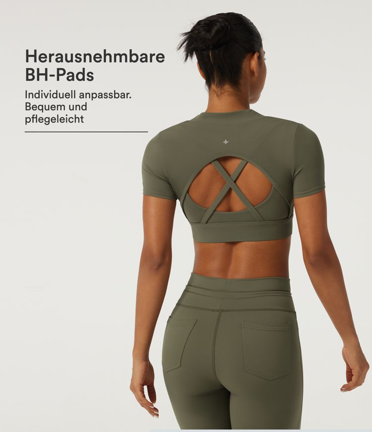 Büro-Top mit Rundhalsausschnitt, kurzen Ärmeln, integriertem BH und Cut-Outs
